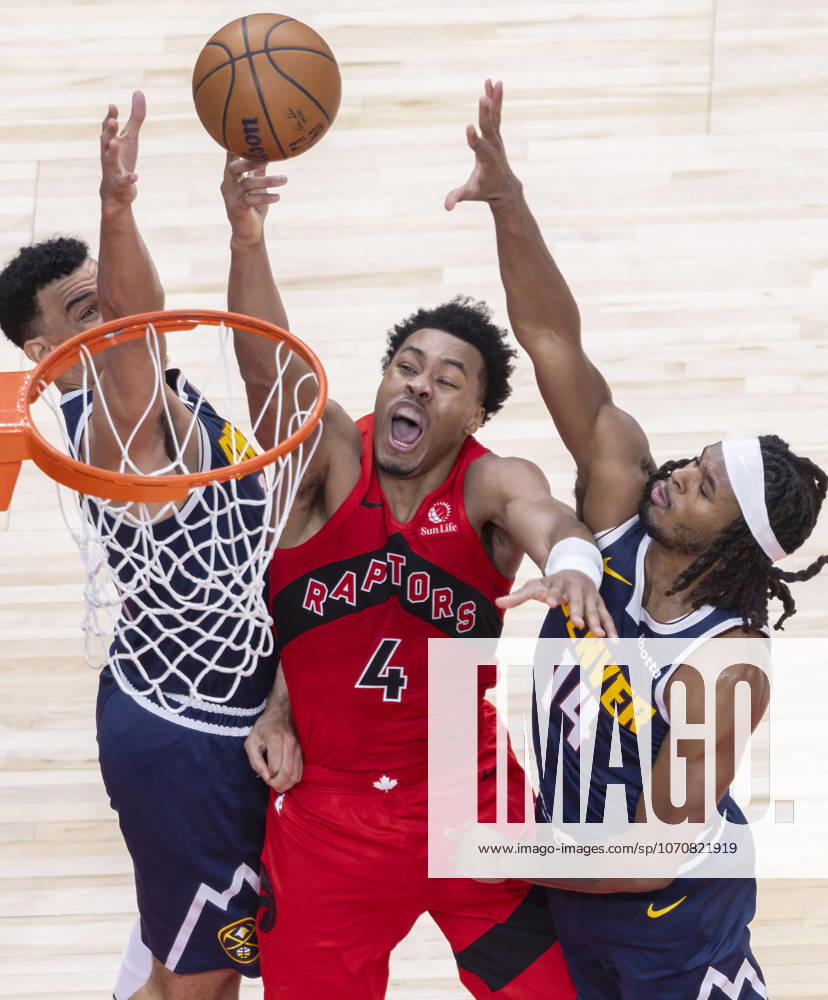 (260101) -- TORONTO, Jan. 1, 2026 -- Scottie Barnes (C) of Toronto Raptors goes for a layup during the 2025-2026 NBA, Basketball Herren, USA regular season game between Toronto Raptors and Denver Nuggets in Toronto, Canada, Dec. 31, 2025. (Photo by Xinhua) (SP) CANADA-TORONTO-NBA-NUGGETS VS RAPTORS ZouxZheng