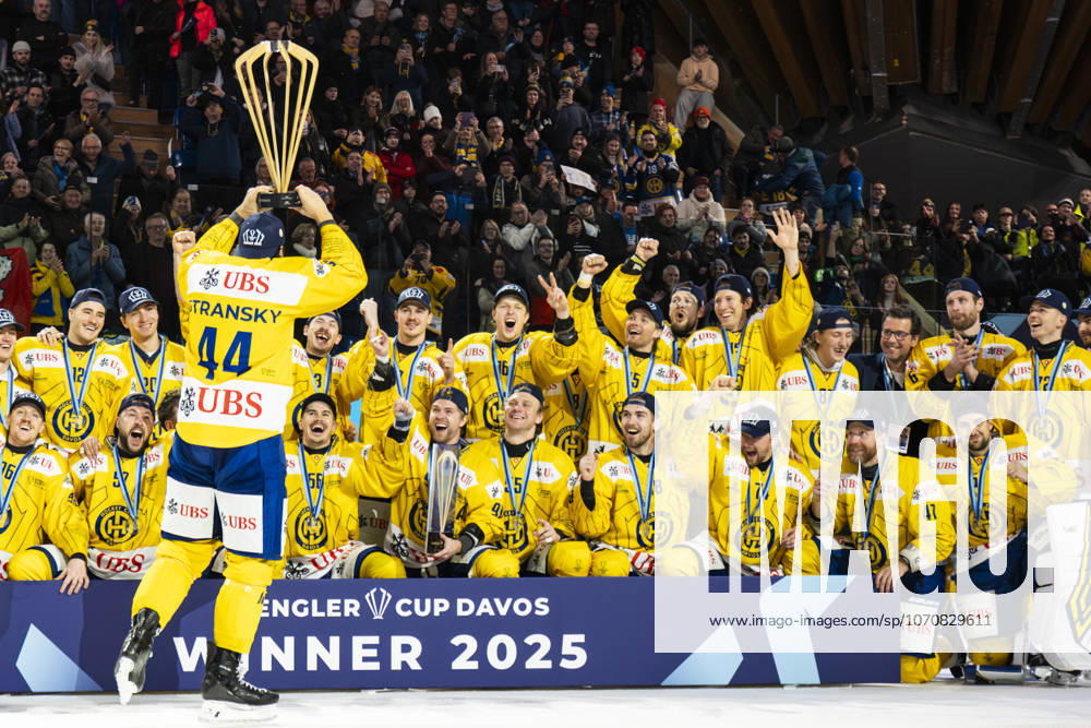 DAVOS, SWITZERLAND DECEMBER 31 Matej Stransky of Davos as Captain rise the Cup to celebrates victory during the Spengler Cup Davos match between U S Collegiate Selects and HC Davos at Zondacrypto Arena on December 31, 2025 in Davos, Switzerland Davos Graubunden Switzerland