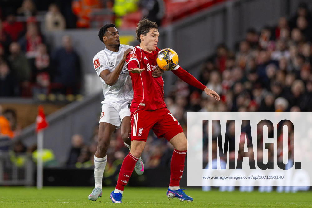 Football - FA Cup - 3rd Round - Liverpool FC v Barnsley FC LIVERPOOL, ENGLAND - Monday, January 12, 2026: Liverpool s Federico Chiesa (R) is challenged by Barnsley s Nathanael Ogbeta during the FA Cup 3rd Round match between Liverpool FC and Barnsley FC at Anfield. (Photo by David Rawcliffe Propaganda) LIVERPOOL Anfield MERSEYSIDE ENGLAND