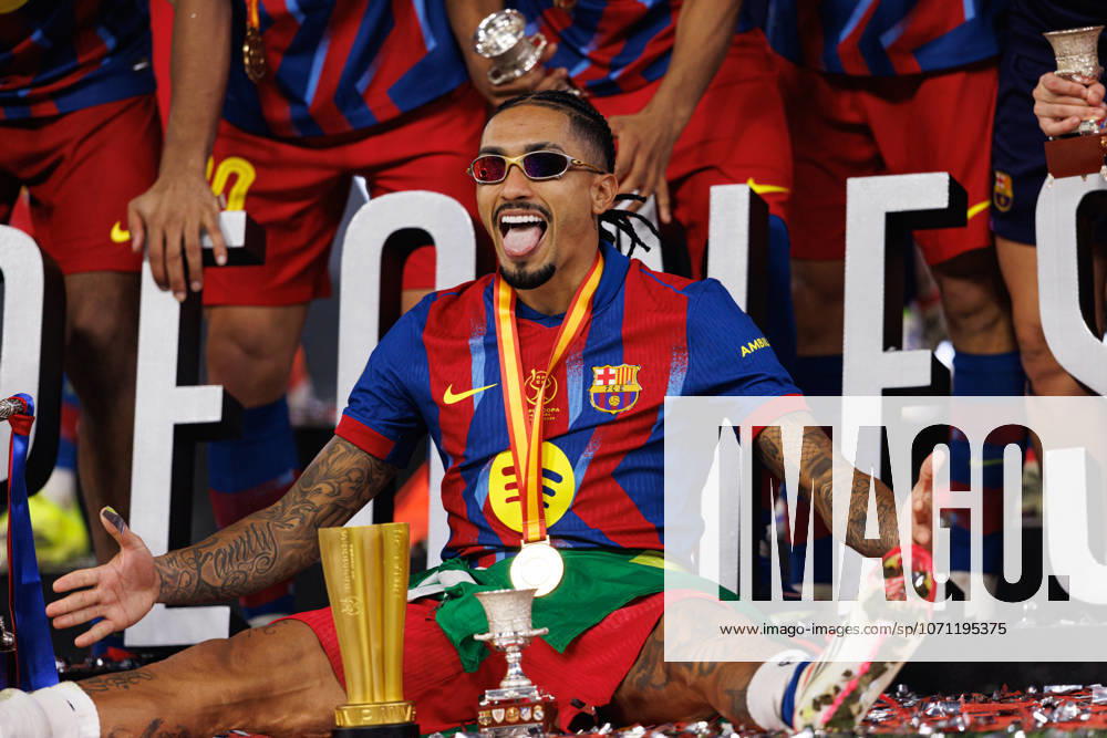 Raphinha seen celebrating with a trophy during Spanish Supercup Final game between teams of FC Barcelona, Barca and Real Madrid (Maciej Rogowski Ball Raw Images) Jeddah King Abdullah Sports City Saudi Arabia