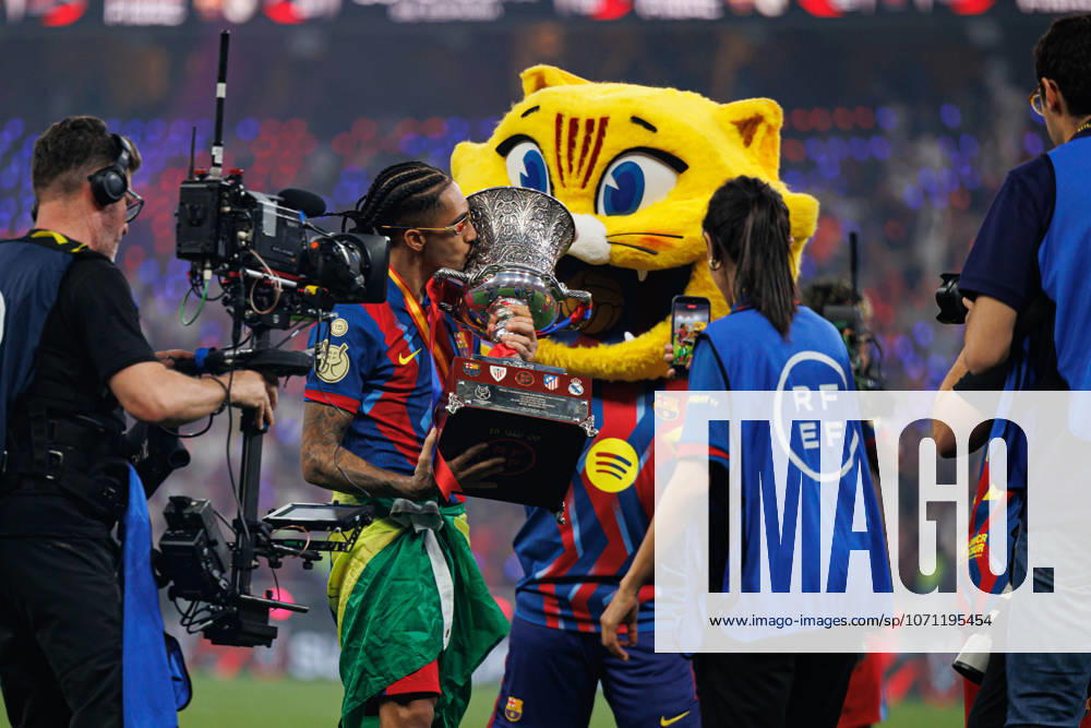 Raphinha seen celebrating with a trophy during Spanish Supercup Final game between teams of FC Barcelona, Barca and Real Madrid (Maciej Rogowski Ball Raw Images) Jeddah King Abdullah Sports City Saudi Arabia