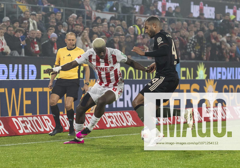 Duel between Ragnar Ache 1 FC Koeln, 9 and Jonathan Tah FC Bayern Muenchen, 4 during the match 1 FC Köln FC Bayern München Football, 1 Bundesliga, RheinEnergieStadion Köln, 14 01 2026 DFL regulations prohibit any use of photographs as image sequences and or quasi video