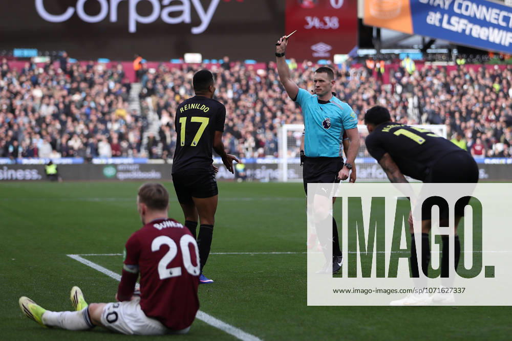 24th January 2026; London Stadium, London, England; Premier League Football, West Ham United versus Sunderland; Reinildo Mandava of Sunderland receives a yellow card for a foul on Jarrod Bowen of West Ham United KatiexChan Content restricted for UK based newspaper
