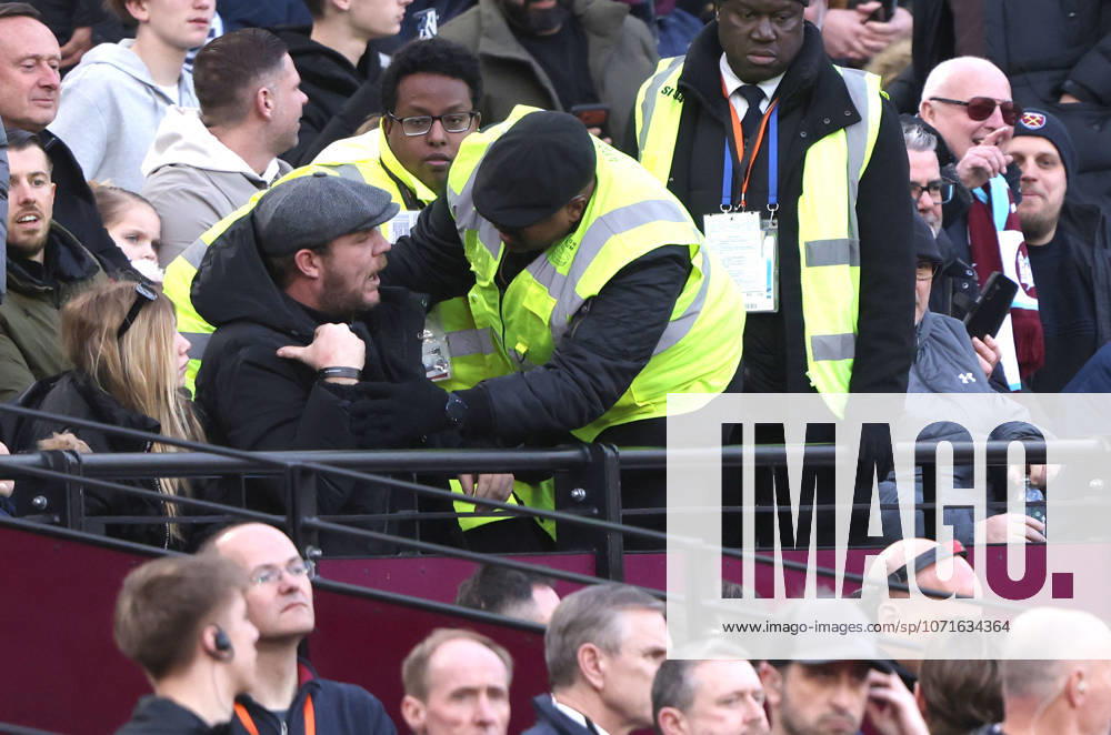 A steward speaks to a West Ham fan after Granit Xhaka (S) (bottom right) had an exchange of views with him at the West Ham United v Sunderland EPL match, at the London Stadium, London, UK on 24th January, 2026.