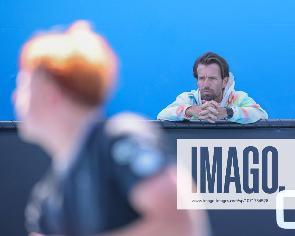 Jamie Mackenzie GER blurred in the foreground, Trainer,coach Gero Kretschmer, Boys Singles, Boys Singles,Australian Open 2026, Melbourne Park, Melbourne, Victoria, Australia ,