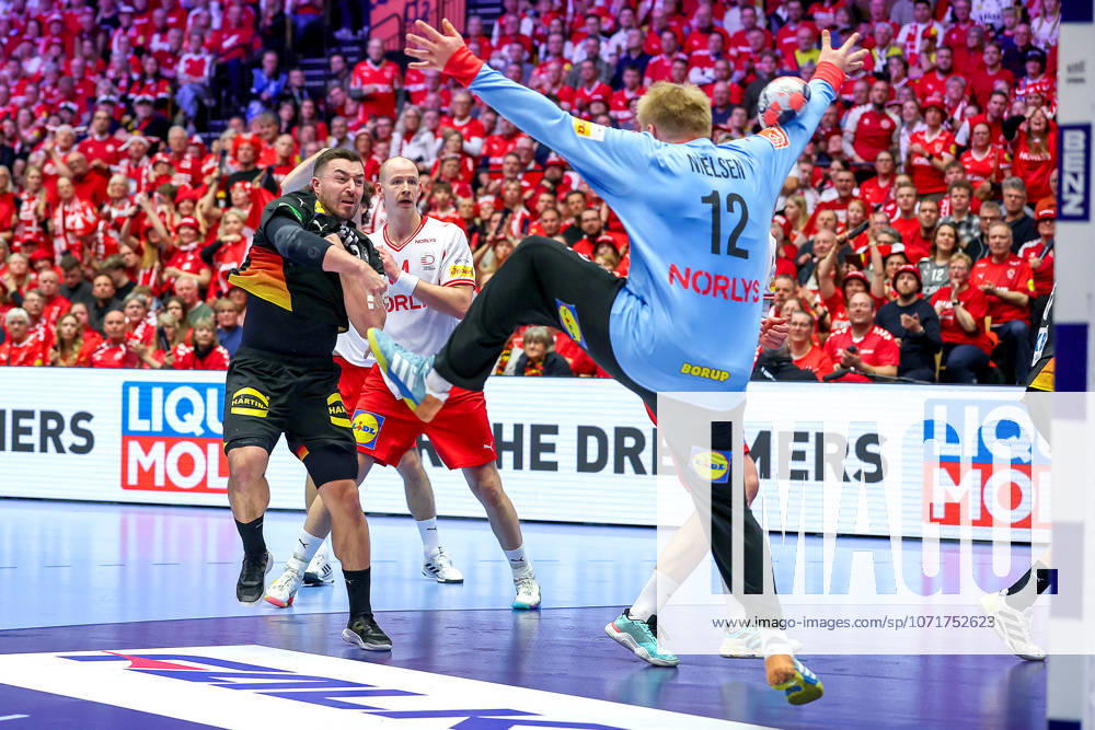 Handball, Men s EHF EURO 2026, Germany Denmark, Jyske Bank Boxen in Herning, Denmark, Main Round Emil Nielsen Denmark 12 saves the throw of Jannik Kohlbacher Germany 80 Denmark