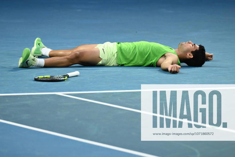 TENNIS AUSTRALIAN OPEN, Carlos Alcaraz of Spain collapses to the court as he takes match point during the mens semifinal against Alexander Zverev of Germany on day 13 of the 2026 Australian Open tennis tournament at Melbourne Park in Melbourne, Friday, January 30, 2026. ( NO ARCHIVING MELBOURNE VICTORIA AUSTRALIA