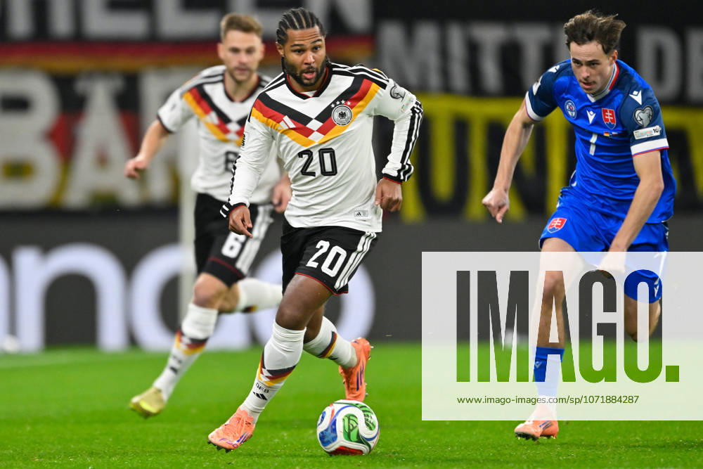 Leipzig, Red Bull Arena, 17 11 25, GER, Men, Qualification World Cup 2026, Germany Slovakia Picture from left in duel Serge GNABRY Germany and Leo SAUER Slovakia UEFA regulations prohibit any use of photographs as image sequences and or quasi video Saxony Germany