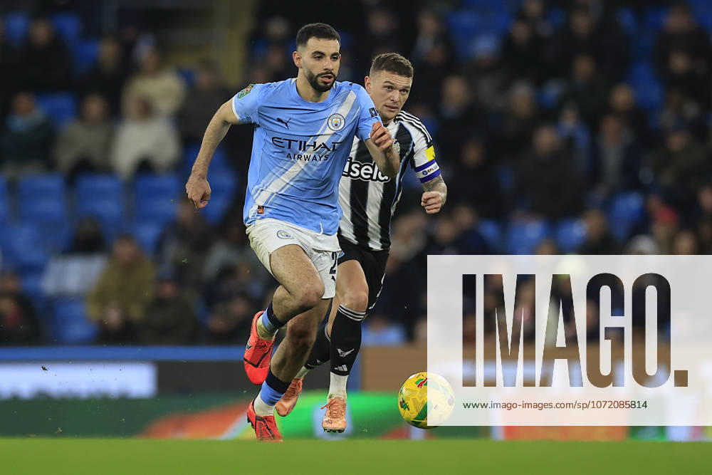 Manchester City v Newcastle United, EFL Cup, Semi Final Second Leg Rayan Ait-Nouri (21) of Manchester City runs with the ball chased by Kieran Trippier (2) of Newcastle United during the EFL Cup semi-final 2nd leg match between Manchester City and Newcastle United at the Etihad Stadium, Manchester, UK on 4 February 2026. Manchester Etihad Stadium Manchester UK Editorial use only DataCo restrictions apply See www.football-dataco.com ,