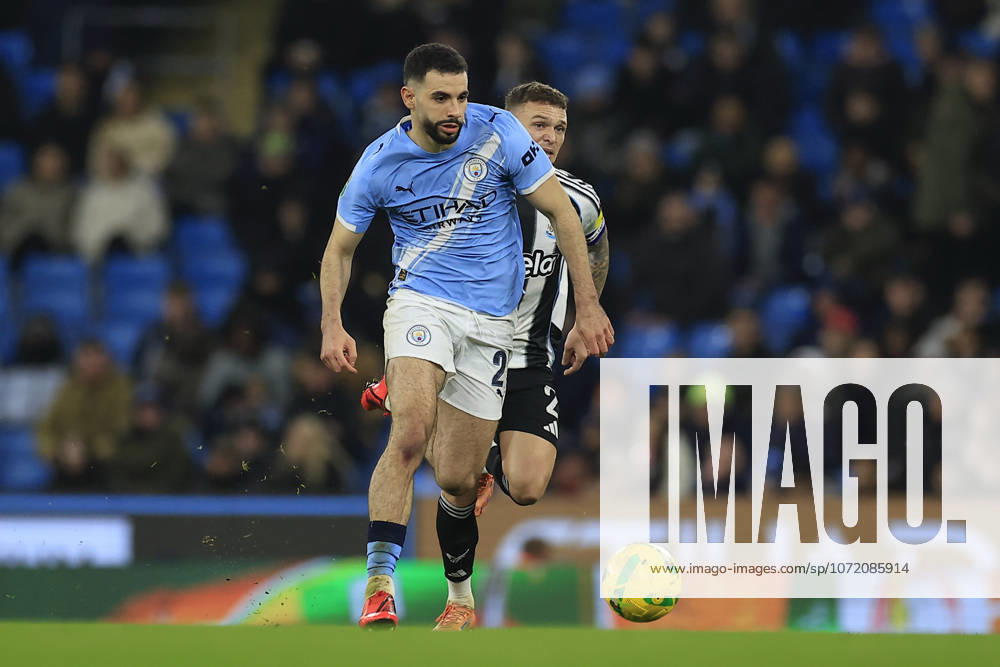 Manchester City v Newcastle United, EFL Cup, Semi Final Second Leg Rayan Ait-Nouri (21) of Manchester City runs with the ball chased by Kieran Trippier (2) of Newcastle United during the EFL Cup semi-final 2nd leg match between Manchester City and Newcastle United at the Etihad Stadium, Manchester, UK on 4 February 2026. Manchester Etihad Stadium Manchester UK Editorial use only DataCo restrictions apply See www.football-dataco.com ,