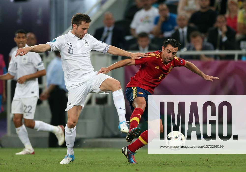 Spain V France, UEFA EURO, EM, Europameisterschaft,Fussball 2012 Quarter Final Yohan Cabaye of France and Xavi Hernandez of Spain challenge during the UEFA Euro 2012 Quarter Final match between Spain and France at Donbass Arena on June 23, 2012 in Donetsk, Ukraine. Donetsk Donbass Arena Ukraine Ukraine