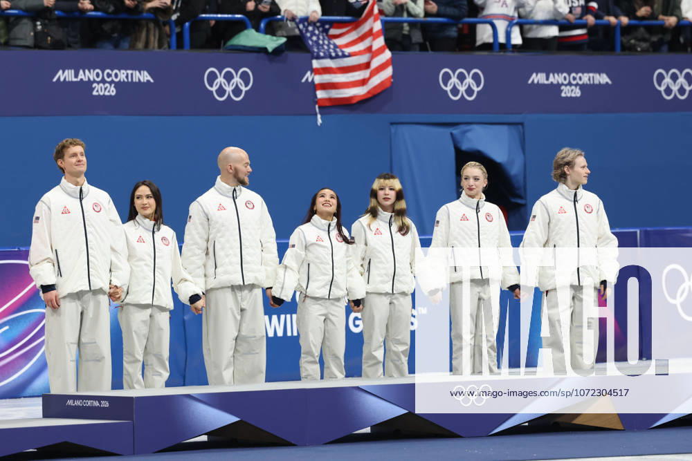 TEAM USA skaters celebrate winning the gold medal during the Victory Ceremony of the Figure skating, Eiskunstlauf Team Event at the Milano Cortina 2026 Winter Olympic Games, Olympische Spiele, Olympia, OS Olympics 2026: Milano Cortina: Figure Skating Team Event - ZUMAc179 20260208_oly_c179_148