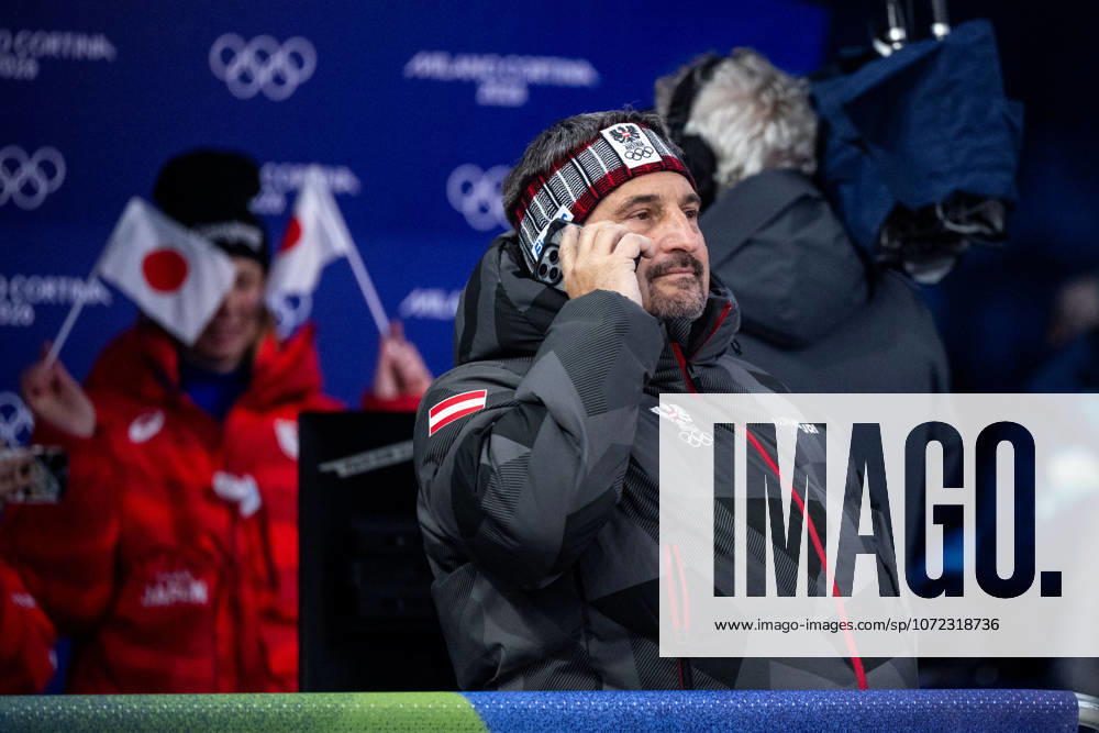 HACKL Georg Oesterreich, coach on the phone, ITA, Olympic Games Milano Cortina 2026, Olympia, Luge Men Single, 08 02 2026 ITA, Olympic Games Milano Cortina 2026, Olympia, Luge Men Single, 08 02 2026 Cortina d Ampezzo