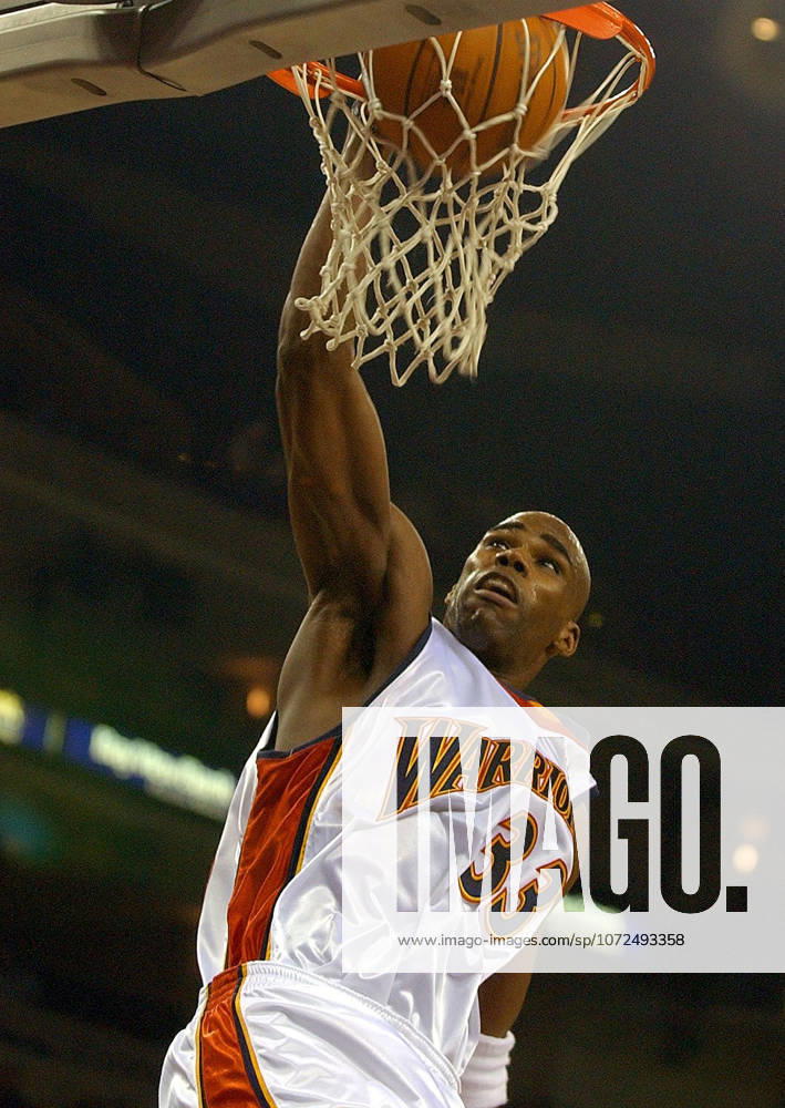 Dec 30, 2002; Oakland, CA, USA; Golden State Warriors Antawn Jamison dunks a basket against the Phoenix Suns at The Arena in Oakland, Calif. on Saturday November 30, 2002. Jamison scored 37 points as the Warriors beat the Suns 100-90. Oakland CA USA