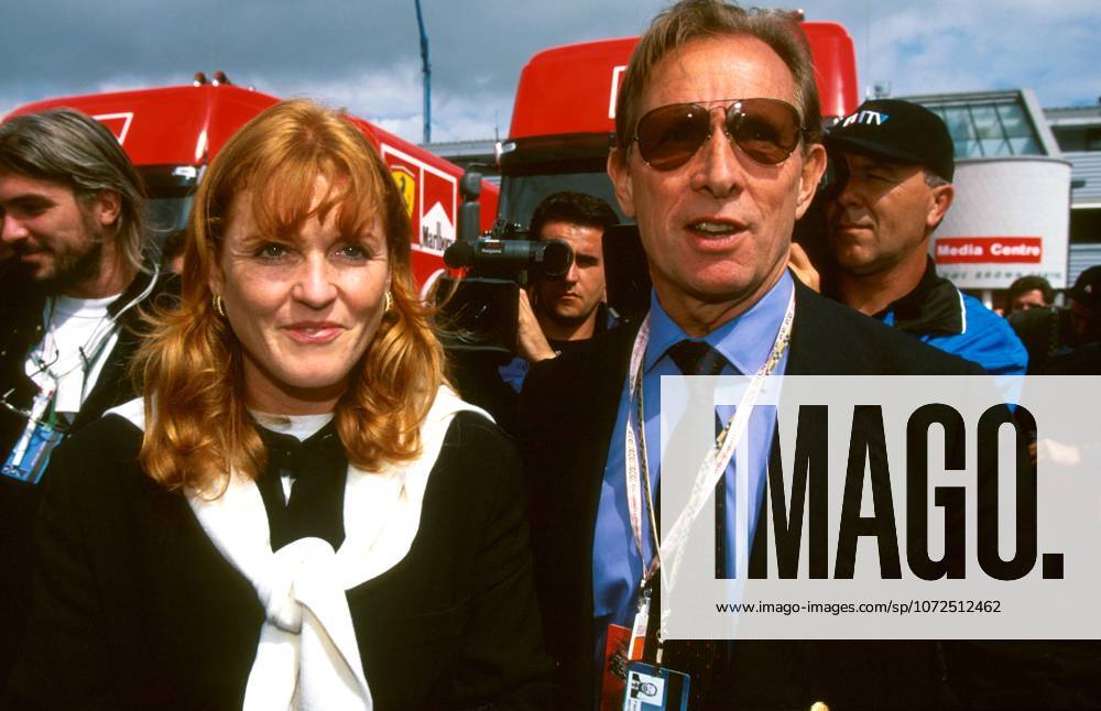 Sarah Ferguson (GBR) with Paddy McNally (IRL) Allsport Management..Formula One World Championship, WM, Weltmeisterschaft Rd9, British Grand Prix, Silverstone, England