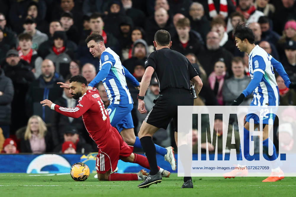 Liverpool v Brighton & Hove Albion, Emirates FA Cup Pascal Gross of Brighton And Hove Albion fouls Mohamed Salah of Liverpool, PENALTY, during the Liverpool v Brighton & Hove Albion Emirates FA Cup 4th Round match at Anfield, Liverpool, England on 14 February 2026 Credit: Ian Stephen Every Second Media Editorial use only. All images are copyright Every Second Media Limited. No images may be reproduced without prior permission. All rights reserved. Premier League and Football League images are subject to licensing agreements with Football DataCo Limited. see https: www.football-dataco.com