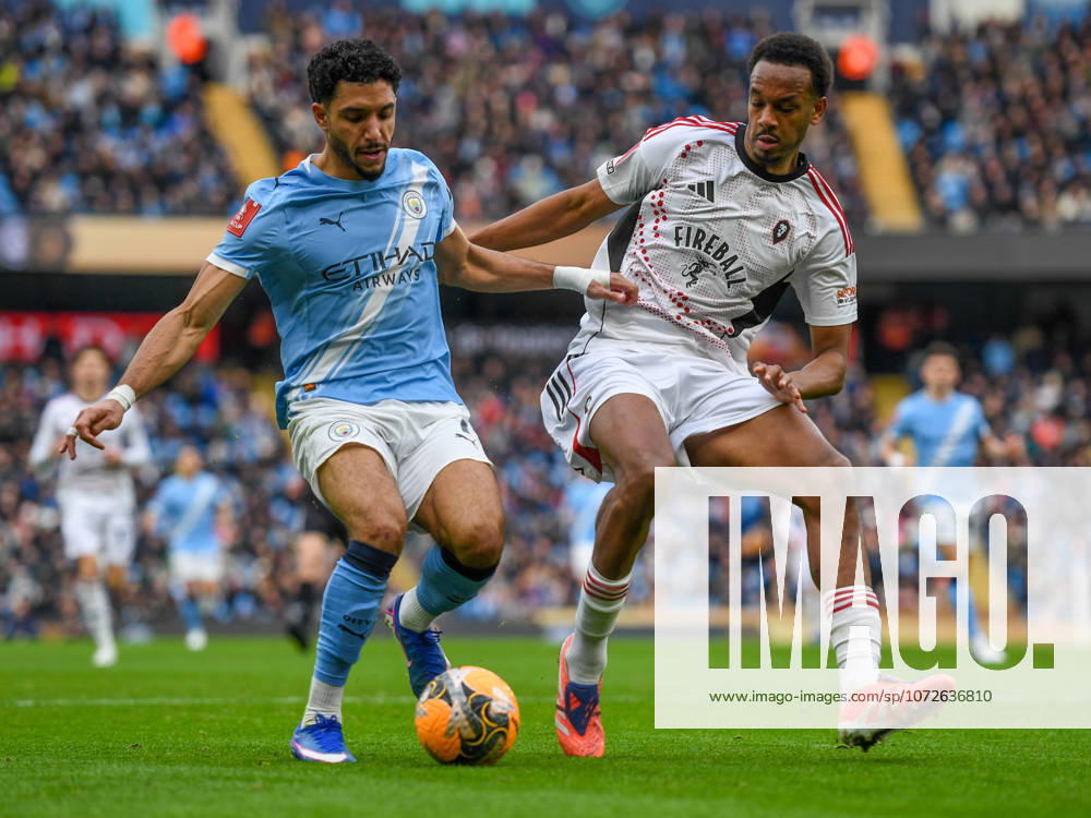 Manchester City v Salford City Emirates FA Cup Omar Marmoush of Manchester City and Zach Awe of Salford City during the Emirates FA Cup Fourth Round match at the Etihad Stadium, Manchester 14 02 2026 UK Newspapers OUT