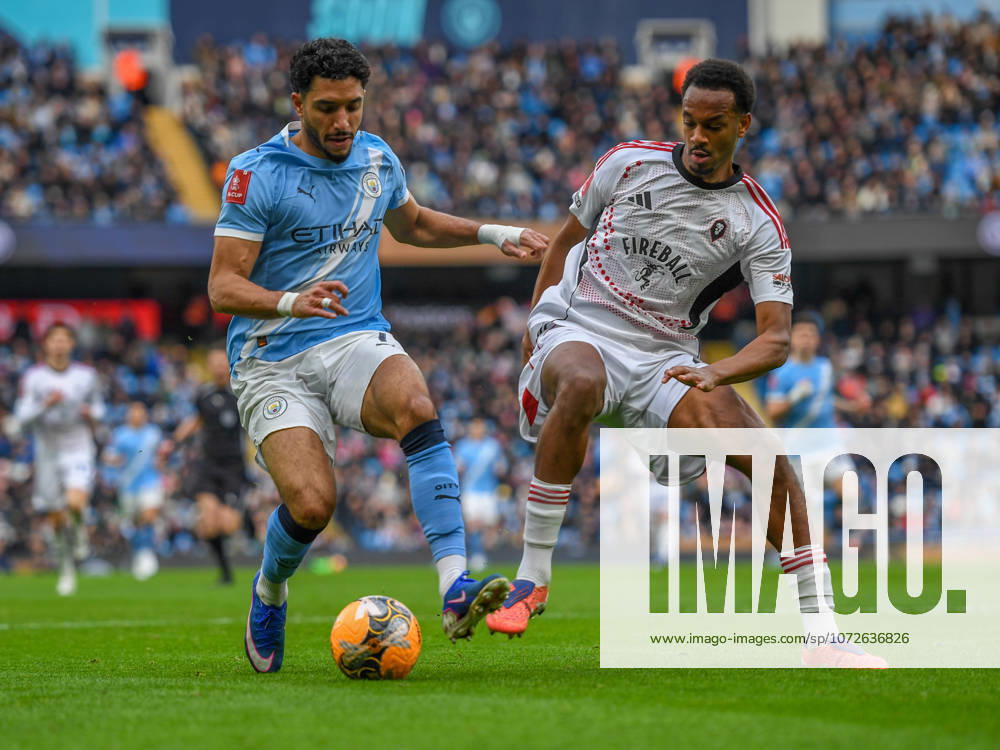 Manchester City v Salford City Emirates FA Cup Omar Marmoush of Manchester City and Zach Awe of Salford City during the Emirates FA Cup Fourth Round match at the Etihad Stadium, Manchester 14 02 2026 UK Newspapers OUT