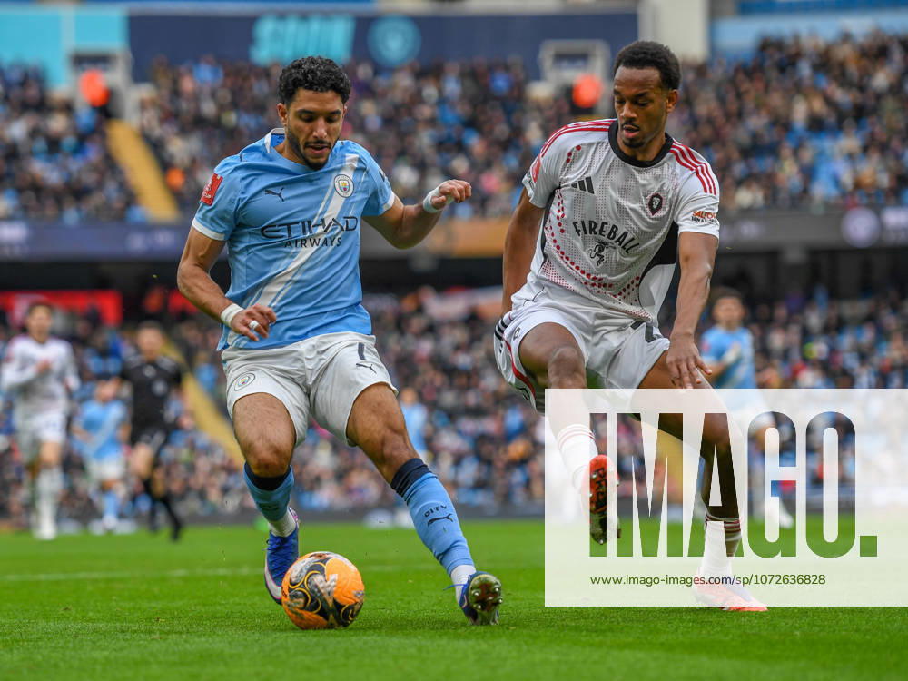 Manchester City v Salford City Emirates FA Cup Omar Marmoush of Manchester City and Zach Awe of Salford City during the Emirates FA Cup Fourth Round match at the Etihad Stadium, Manchester 14 02 2026 UK Newspapers OUT