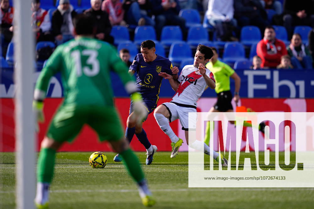 Nahuel Molina of Atletico de Madrid and Fran Perez of Rayo Vallecano compete for the ball during the Spanish League, LaLiga EA Sports, football match played between Rayo Vallecano and Atletico de Madrid at Butarque stadium on February 15, 2026, in Leganes, Madrid, Spain. Leganes Spain - ZUMAa181 20260215_zaa_a181_096