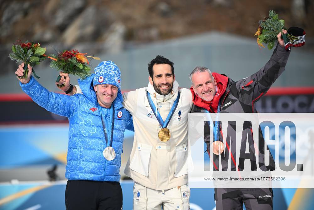 Hurajt Pavol slo Fourcade Martin fra Sumann Christoph aut BIATHLON JO MILAN CORTINA 2026 2026 POURSUITE 12 5 KM HOMMES BIATHLON ARENA ANTHOLZ ANTERSELVA ITALIE 15 02 2026 GARNIER ETIENNE Following the doping disqualification of Russian Evgeny Ustyugov, the mass start podium at the Vancouver 2010 Olympic Games has been awarded to Frances Martin Fourcade for gold, Slovakias Pavol Hurajt for silver and Austrias Christoph Sumann for bronze ANTHOLZ ANTERSELVA BIATHLON ARENA Italy GermanyxJapanxUKxFrancexBelgiumxOUT