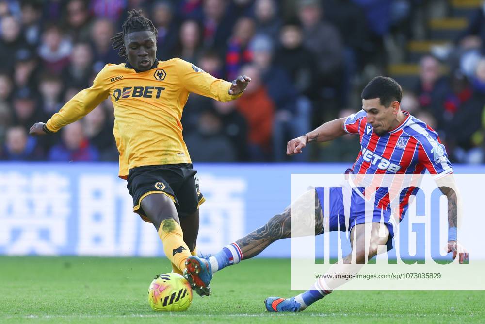 Mateus Mane of Wolverhampton Wanderers tackled by Daniel Munoz of Crystal Palace Crystal Palace v Wolverhampton Wanderers, Premier League, Football, Selhurst Park, London, UK - 22 Feb 2026London Selhurst Park United Kingdom