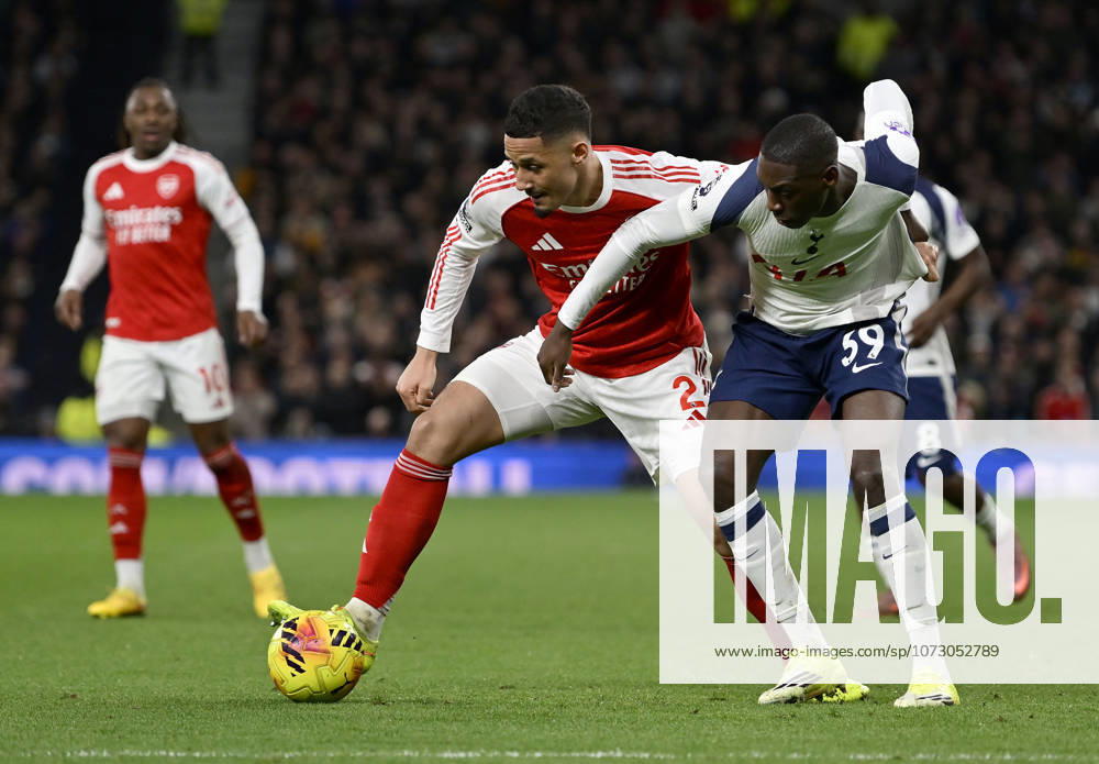 Tottenham Hotspur V Arsenal. Premier League William Saliba (Arsenal) and Randal Kolo Muani (Spurs) during the Tottenham Hotspur V Arsenal Premier League match at the Tottenham Hotspur Stadium, London. Tottenham Tottenham Hotspur Stadium UK