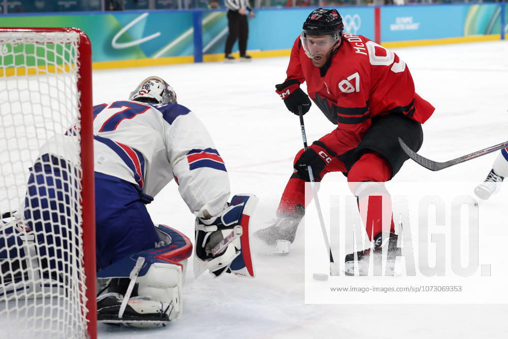 Milano Cortina 2026, Milan, Italy, 22.02, 2026, MiCo2026, MiCo, 2026, Olympics, Olympic, Winter Olympic, Olympic Winter games, Winterspiele,Spiele, Summer games Ice hockey, Eishockey hockey, USA, Canada, final Connor Hellebuyck of United States and Connor McDavid of Canada in action during Ice Hockey final game between Canada and United States of Milano Cortina 2026 Olympic Winter Games in Milan, Italy, 22.02.2026. Photo: Roman Koksarov (RKF) Milan Italy