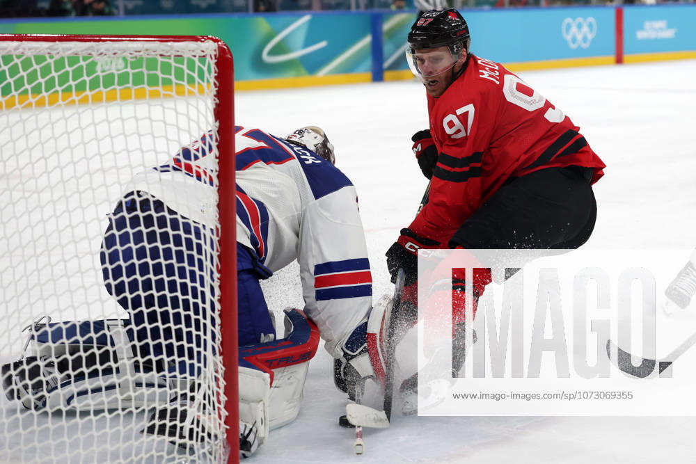 Milano Cortina 2026, Milan, Italy, 22.02, 2026, MiCo2026, MiCo, 2026, Olympics, Olympic, Winter Olympic, Olympic Winter games, Winterspiele,Spiele, Summer games Ice hockey, Eishockey hockey, USA, Canada, final Connor Hellebuyck of United States and Connor McDavid of Canada in action during Ice Hockey final game between Canada and United States of Milano Cortina 2026 Olympic Winter Games in Milan, Italy, 22.02.2026. Photo: Roman Koksarov (RKF) Milan Italy