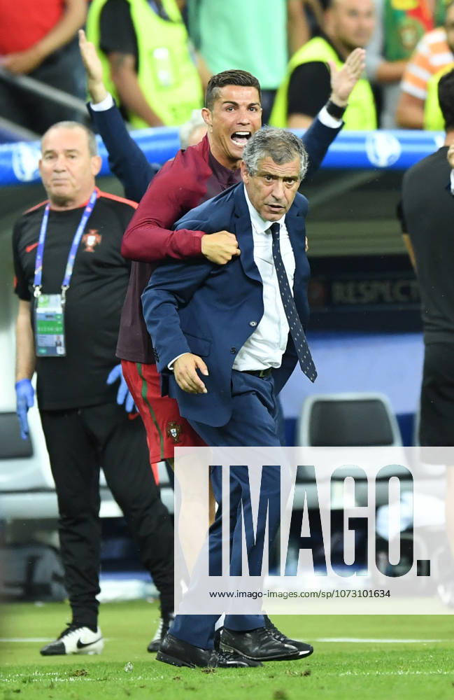 Portugal wins UEFA EURO, EM, Europameisterschaft,Fussball 2016 PARIS, FRANCE - JULY 10: Portugal s Cristiano Ronaldo and head coach of Portugal Fernando Santos are seen during the Euro 2016 final football match between Portugal and France at the Stade de France in Saint-Denis, north of Paris, France on July 10, 2016. Ile-de-France France. Editorial use only. Please get in touch for any other usage.