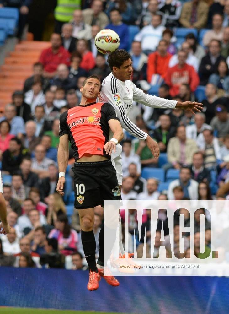 Real Madrid CF v UD Almeria - La Liga MADRID, SPAIN - APRIL 29: Raphael Varane (R) of Real Madrid CF vies for ball with Tomer Hemed of UD Almeria during the La Liga match between Real Madrid CF and UD Almeria at Estadio Santiago Bernabeu on April 29, 2015 in Madrid, Spain. Evrim Aydin Anadolu Agency Madrid Spain. Editorial use only. Please get in touch for any other usage.