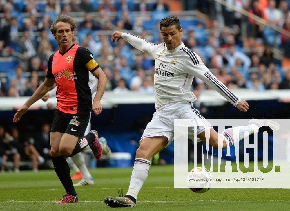 Real Madrid CF v UD Almeria - La Liga MADRID, SPAIN - APRIL 29: Cristiano Ronaldo (R) of Real Madrid CF in action during the La Liga match between Real Madrid CF and UD Almeria at Estadio Santiago Bernabeu on April 29, 2015 in Madrid, Spain. Evrim Aydin Anadolu Agency Madrid Spain. Editorial use only. Please get in touch for any other usage.
