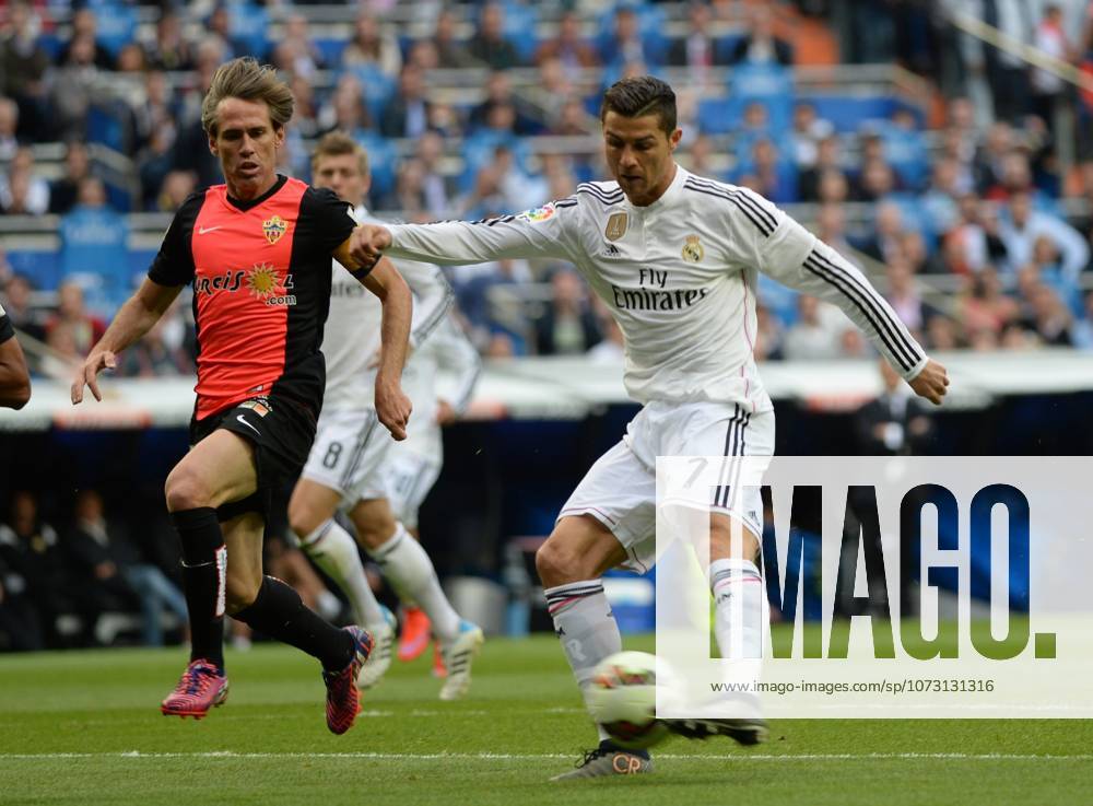 Real Madrid CF v UD Almeria - La Liga MADRID, SPAIN - APRIL 29: Cristiano Ronaldo (R) of Real Madrid CF in action during the La Liga match between Real Madrid CF and UD Almeria at Estadio Santiago Bernabeu on April 29, 2015 in Madrid, Spain. Evrim Aydin Anadolu Agency Madrid Spain. Editorial use only. Please get in touch for any other usage.
