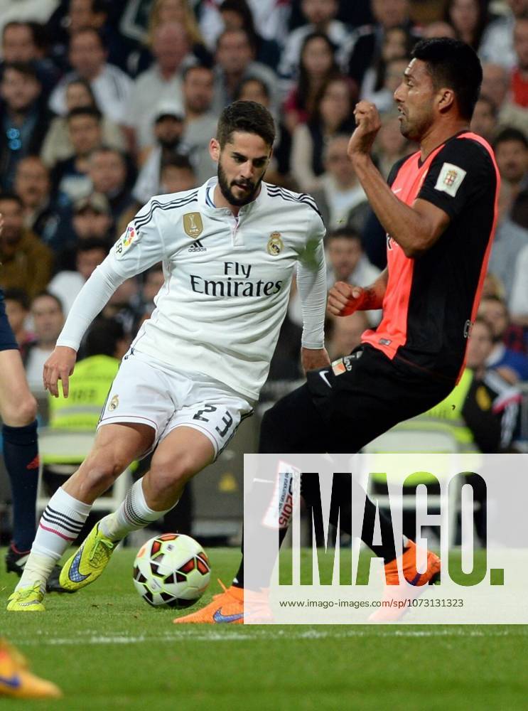 Real Madrid CF v UD Almeria - La Liga MADRID, SPAIN - APRIL 29: Isco (L) of Real Madrid CF in action during the La Liga match between Real Madrid CF and UD Almeria at Estadio Santiago Bernabeu on April 29, 2015 in Madrid, Spain. Evrim Aydin Anadolu Agency Madrid Spain. Editorial use only. Please get in touch for any other usage.
