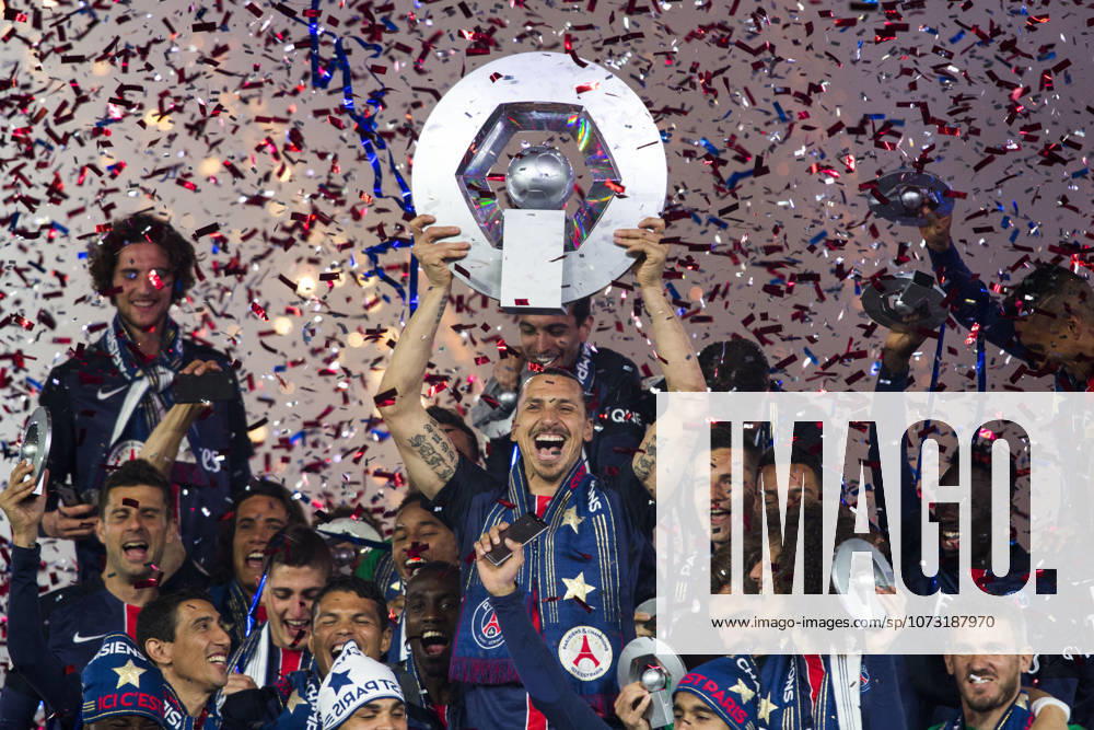 Paris Saint-Germain v FC Nantes - Ligue 1 PARIS, FRANCE - MAY 14: Paris Saint-Germain s Swedish forward Zlatan Ibrahimovic holds the trophy on the podium after winning the French L1 title at the end of the French L1 football match between Paris Saint-Germain (PSG) vs Nantes on May 14, 2016 at the Parc des Princes stadium in Paris, France. Ile-de-France France. Editorial use only. Please get in touch for any other usage.