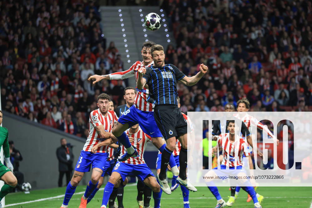Spain - Atletico de Madrid vs Club Brugge KV - 24 02 2026 SPAIN, MADRID, FEBRUARY 24. Brandon Mechele of Brugge heads the ball under pressure from Marc Pubill of Atletico de Madrid and provides the assist for his team s opening goal during the UEFA Champions League Knockout Play-off Second Leg football match between Atletico de Madrid and Club Brugge KV at Estadio Riyadh Air Metropolitano on February 24, 2026 in Madrid, Spain. Photo by Manuel Blondeau AOP.Press Madrid Riyadh Air Metropolitano Spain