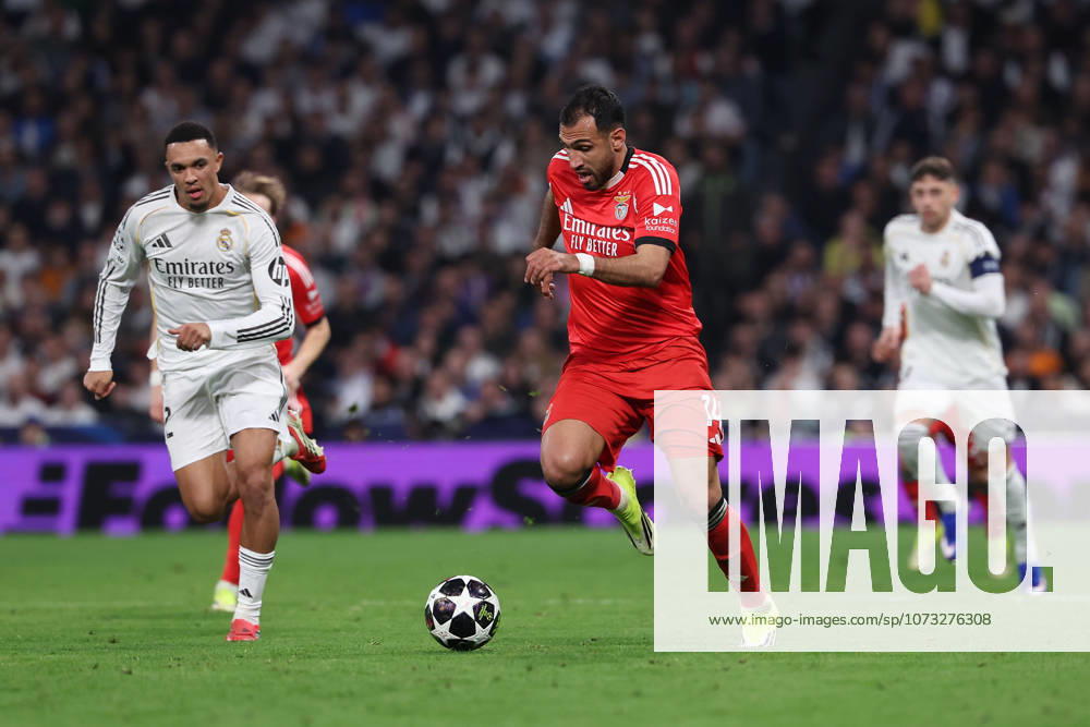 Madrid, Spain February 25, 2026 FBL UEFA Champions League 2025 26 Real Madrid SL Benfica Trent Alexander Arnold Real Madrid , Vangelis Pavlidis S L Benfica in action, with the ball during the UEFA Champions League 2025 26 knockout play offs match between Real Madrid and SL Benfica at the Santiago Bernabà u Stadium on February 25, 2026 in Madrid, Spain