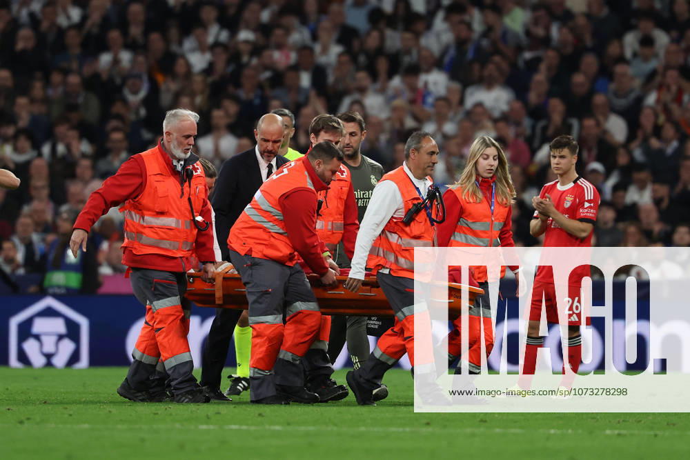Madrid, Spain February 25, 2026 FBL UEFA Champions League 2025 26 Real Madrid SL Benfica Raul Asencio Real Madrid is carried off the pitch during the UEFA Champions League 2025 26 knockout play offs match between Real Madrid and SL Benfica at the Santiago Bernabà u Stadium on February 25, 2026 in Madrid, Spain