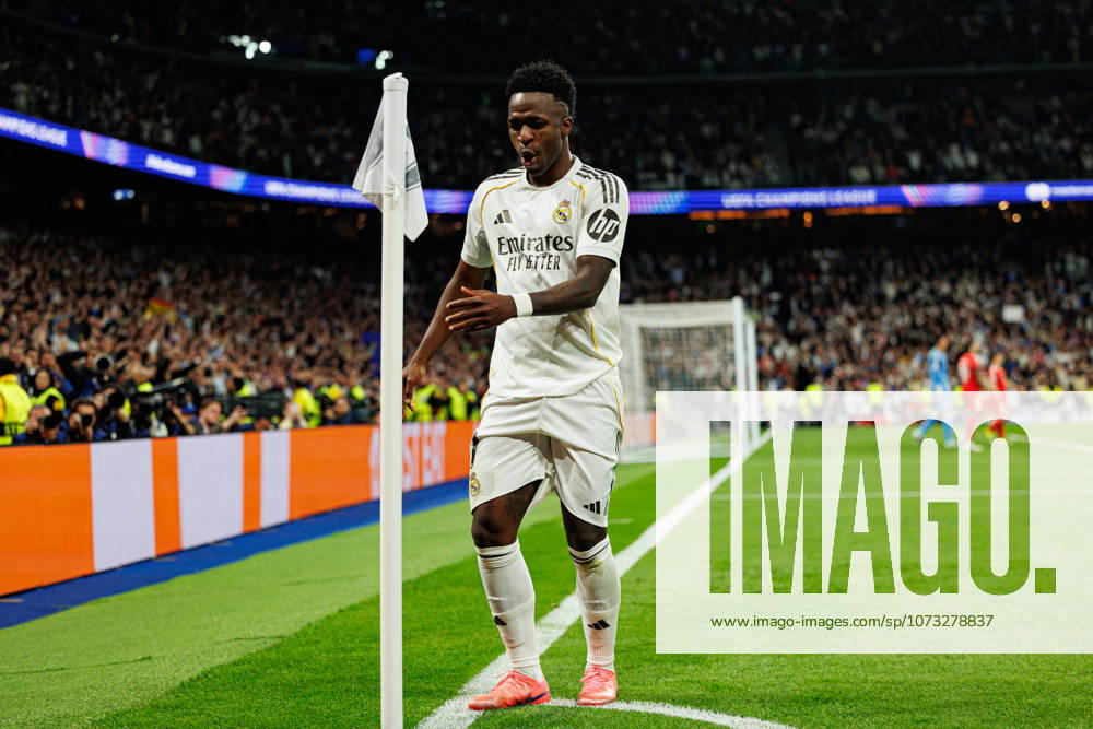 Vinicius Vini Junior seen celebrating after scoring goal during Champions League knock out play off game between teams of Real Madrid CF and SL Benfica (Maciej Rogowski Ball Raw Images) Madrid Bernabeu Spain