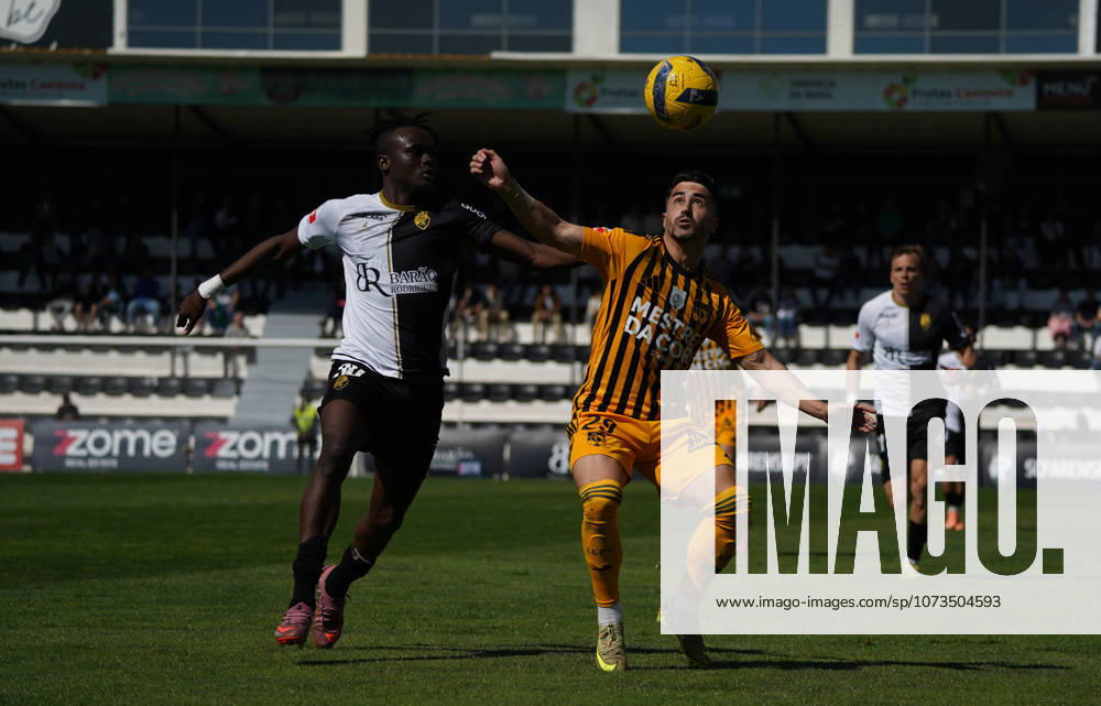 Liga Portugal 2 Meu Super Round 24 football match between SC Farense and Lusitania Lourosa FC, Faro, Portugal Faro, Portugal. 1 st Mar, 2026. Tiago Cerveira of Lourosa FC, trygint to control the ball with the opposition of Bala Sangare, SC Farense player, during the SC Farense 2 - 1 Lusitano Lourosa FC Round 24 match for the football Liga Portugal 2 Meu Super. Nuno Pires Veloso Alamy Live News