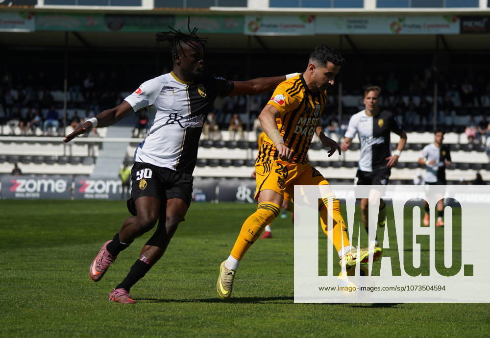 Liga Portugal 2 Meu Super Round 24 football match between SC Farense and Lusitania Lourosa FC, Faro, Portugal Faro, Portugal. 1 st Mar, 2026. Tiago Cerveira of Lourosa FC, trygint to control the ball with the opposition of Bala Sangare, SC Farense player, during the SC Farense 2 - 1 Lusitano Lourosa FC Round 24 match for the football Liga Portugal 2 Meu Super. Nuno Pires Veloso Alamy Live News