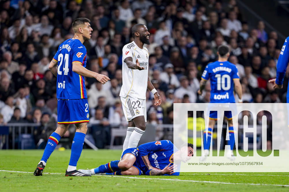 Real Madrid CF v Getafe CF - LaLiga EA Sports Diego Rico of Getafe CF (R) is seen on the ground after receiving a foul from Antonio Rudiger of Real Madrid (L) during the LaLiga EA Sports match between Real Madrid CF and Getafe CF at Estadio Santiago Bernabeu on March 2, 2026 in Madrid, Spain. Madrid Estadio Santiago Bernabeu Madrid Spain