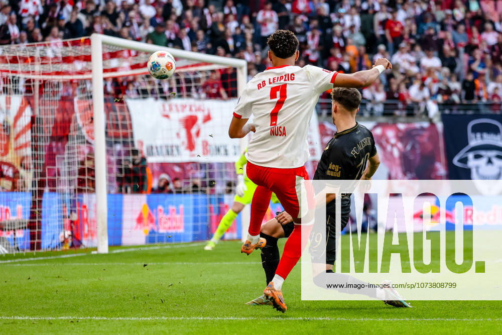 Antonio Nusa RB Leipzig, 07 shot, shoots the ball, Robin Fellhauer FC Augsburg, 19 , RB Leipzig vs FC Augsburg, Football, 1 Bundesliga, 25 Matchday, Season 2025 2026, 07 03 2026,¨ DFL REGULATIONS PROHIBIT ANY USE OF PHOTOGRAPHS AS IMAGE SEQUENCES AND OR QUASI VIDEO,¨ RB Leipzig vs FC Augsburg, Football, 1 Bundesliga, 25 Matchday, Season 2025 2026, 07 03 2026 Leipzig