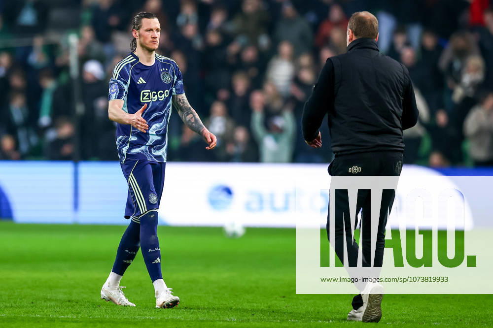 2026-03-07 FC Groningen v Ajax - Dutch Eredivisie GRONINGEN, NETHERLANDS - MARCH 7: Wout Weghorst of AFC Ajax shake hand with Head Coach Dick Lukkien of FC Groningen during the Dutch Eredivisie match between FC Groningen and Ajax at Stadion Euroborg on March 7, 2026 in Groningen, Netherlands. Groningen Stadion Euroborg Netherlands Content not available for redistribution in The Netherlands directly or indirectly through any third parties.