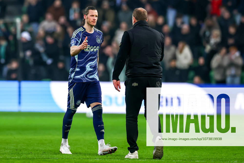 2026-03-07 FC Groningen v Ajax - Dutch Eredivisie GRONINGEN, NETHERLANDS - MARCH 7: Wout Weghorst of AFC Ajax shake hand with Head Coach Dick Lukkien of FC Groningen during the Dutch Eredivisie match between FC Groningen and Ajax at Stadion Euroborg on March 7, 2026 in Groningen, Netherlands. Groningen Stadion Euroborg Netherlands Content not available for redistribution in The Netherlands directly or indirectly through any third parties.