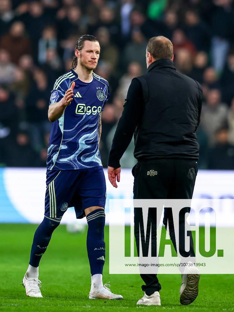 2026-03-07 FC Groningen v Ajax - Dutch Eredivisie GRONINGEN, NETHERLANDS - MARCH 7: Wout Weghorst of AFC Ajax shake hand with Head Coach Dick Lukkien of FC Groningen during the Dutch Eredivisie match between FC Groningen and Ajax at Stadion Euroborg on March 7, 2026 in Groningen, Netherlands. Groningen Stadion Euroborg Netherlands Content not available for redistribution in The Netherlands directly or indirectly through any third parties.