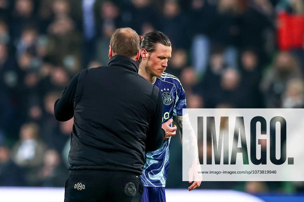 2026-03-07 FC Groningen v Ajax - Dutch Eredivisie GRONINGEN, NETHERLANDS - MARCH 7: Wout Weghorst of AFC Ajax shake hand with Head Coach Dick Lukkien of FC Groningen during the Dutch Eredivisie match between FC Groningen and Ajax at Stadion Euroborg on March 7, 2026 in Groningen, Netherlands. Groningen Stadion Euroborg Netherlands Content not available for redistribution in The Netherlands directly or indirectly through any third parties.