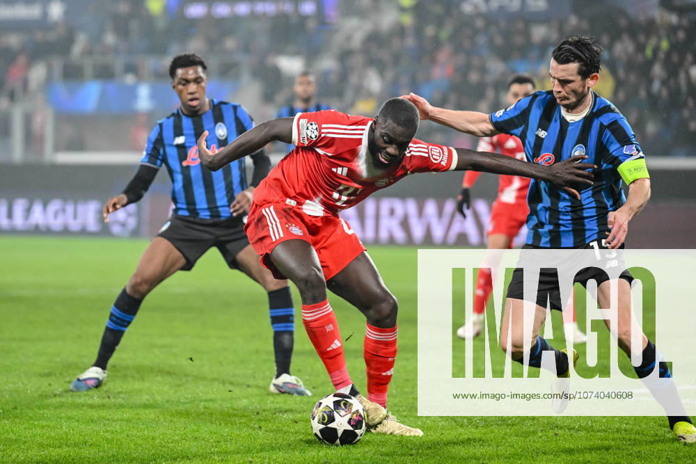Dayot Upamecano FC Bayern München and Marten de Roon Atalanta BC battle for the ball during the UEFA Champions League 2025 26 Round of 16 First Leg match between Atalanta BC and FC Bayern München at Stadio di Bergamo on March 10, 2026 in Bergamo, Italy Photo by Harry Langer DeFodi Images