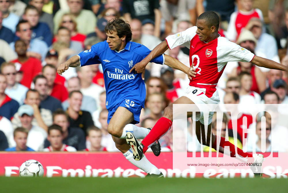 Chelsea V Arsenal, Premier League Gianfranco Zola of Chelsea and Gilberto Silva of Arsenal challenge during the Premier League match between Chelsea and Arsenal at Stamford Bridge on September 1, 2002 in London, England. London Stamford Bridge England United Kingdom