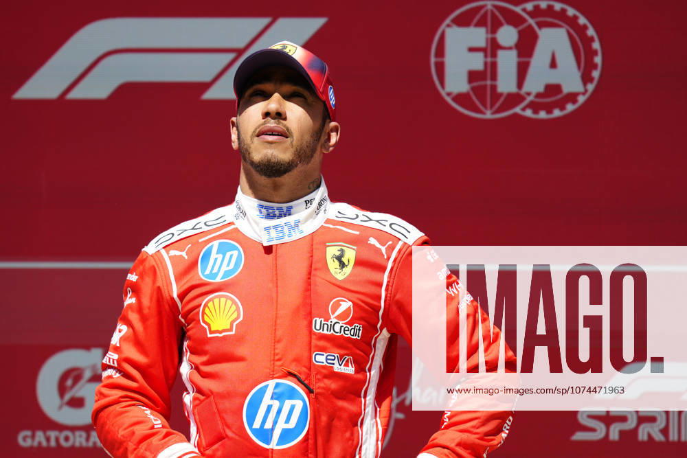 F1 Grand Prix of China Third placed Lewis Hamilton of Great Britain and Scuderia Ferrari looks on in parc ferme during the Sprint ahead of the F1 Grand Prix of China at Shanghai International Circuit on March 14, 2026 in Shanghai, China. Shanghai China